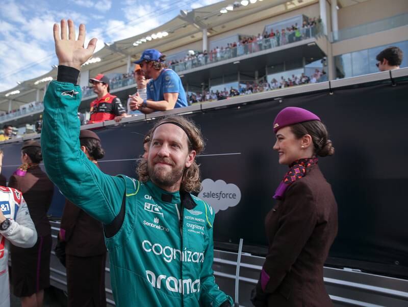 Sebastian Vettel waves to fans during the driver's parade. Victor Besa / The National