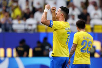 Cristiano Ronaldo celebrates after scoring for Al Nassr during the Asian Champions League Group E football match against Al Duhail at the King Saud University Stadium in Riyadh on October 24, 2023. AFP