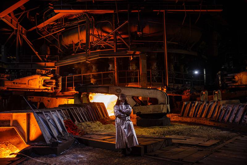 A steel worker works at the blast furnace, Ukraine's third biggest, at Zaporizhstal during the Russian invasion of Ukraine. AFP