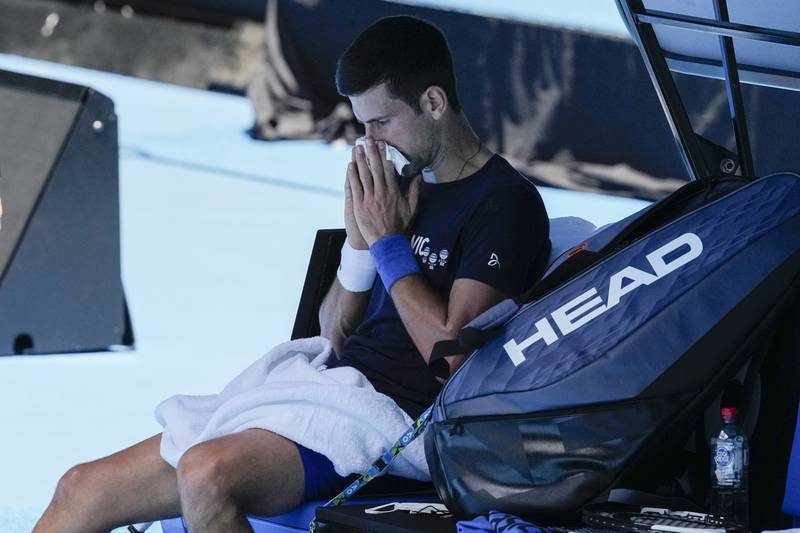 Novak Djokovic rests during a practice session on Rod Laver Arena. AP Photo