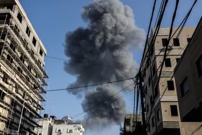 Thick smoke rises following an Israeli air strike on Gaza city. Reuters
