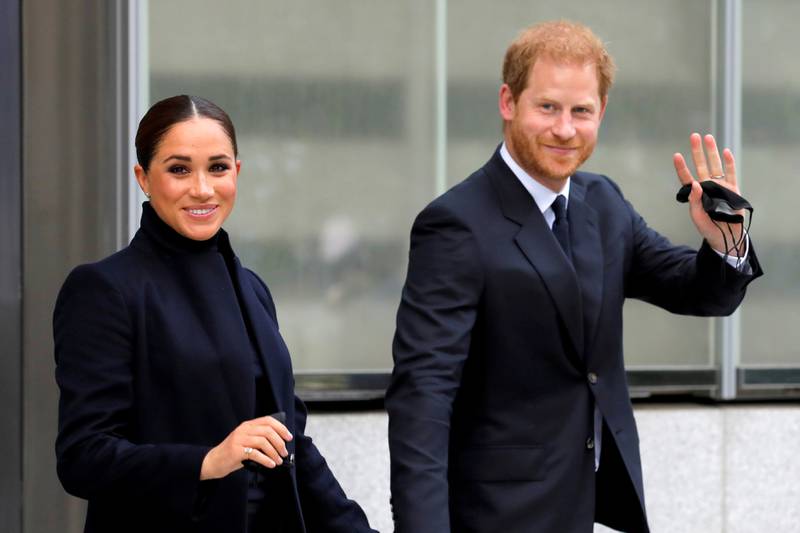 Britain's Prince Harry, pictured with his wife Megan, has launched a legal bid to overturn the UK government's decision preventing him from paying for his own police protection while in the country. Reuters