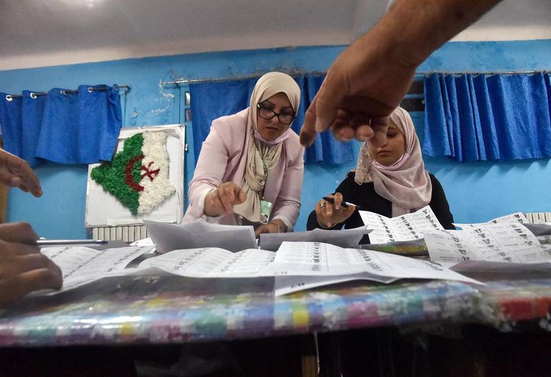 Algerian elections staff count ballots for parliamentary elections at a polling station in Bouchaoui, on the western outskirts of the capital Algiers. AFP