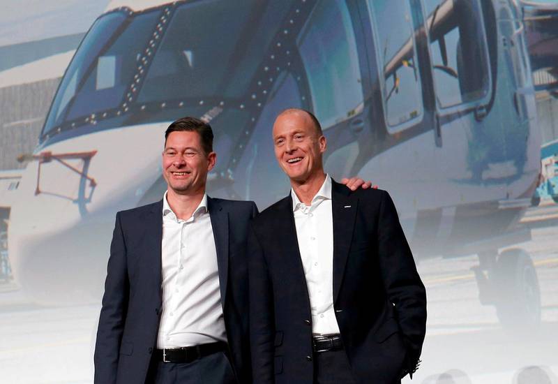 FILE PHOTO: Airbus Chief Executive Tom Enders (R) and Chief Financial Officer Harald Wilhelm (L) after the company's 2017 financial results news conference in Blagnac near Toulouse, France. February 15, 2018. REUTERS/Regis Duvignau/File Photo