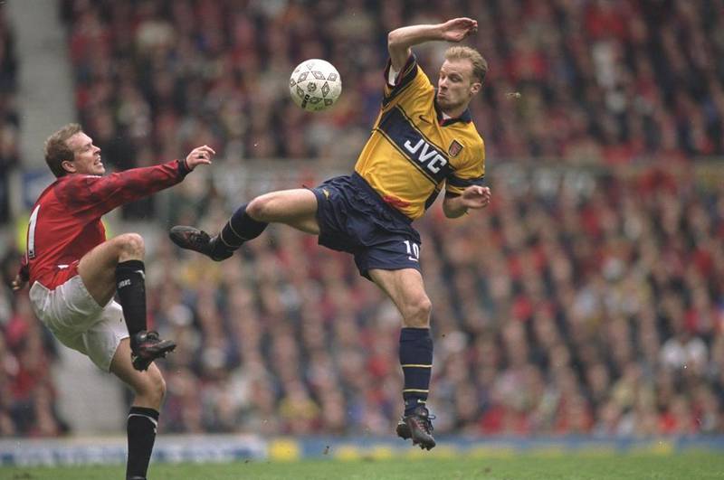 1997/98 - Dennis Bergkamp (Arsenal): 40 appearances, 22 goals. Allsport