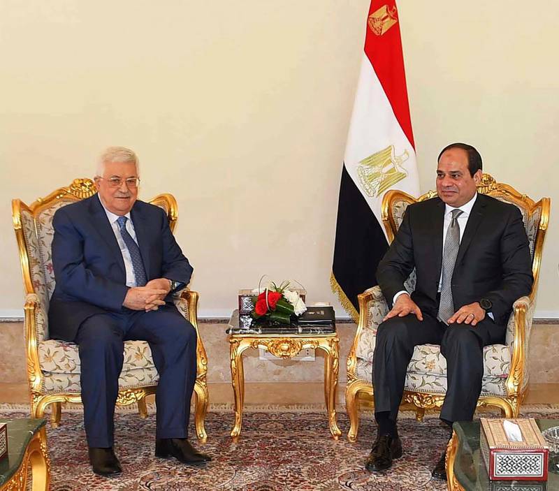 In this Wednesday, Jan. 17, 2018 photo, provided by Egypt's state news agency, MENA, Palestinian President Mahmoud Abbas, left, meets with Egyptian President Abdel-Fattah el-Sissi, in Cairo, Egypt. U.S. Vice President Mike Pence's upcoming visit to the Mideast comes at a time of friction between his administration and the Palestinian leadership, posing a dilemma for Arab hosts Egypt and Jordan on how to safeguard their vital ties with Washington without appearing to ignore Palestinian misgivings.
 (MENA via AP)