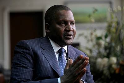 Founder and Chief Executive of the Dangote Group Aliko Dangote gestures during an interview with Reuters in his office in Lagos, Nigeria, June 13, 2012. To match Insight NIGERIA-FOREX/DANGOTE     REUTERS/Akintunde Akinleye/File Photo   - RTX2HPTG
