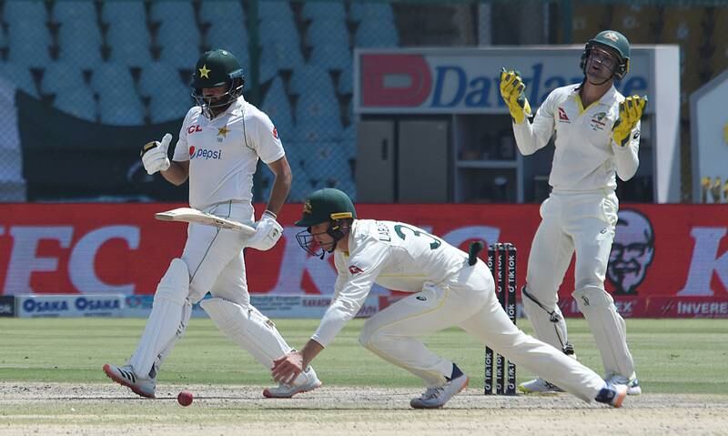 Pakistan's Azar Ali sees a shot drop short of Australian fielder at short leg. EPA