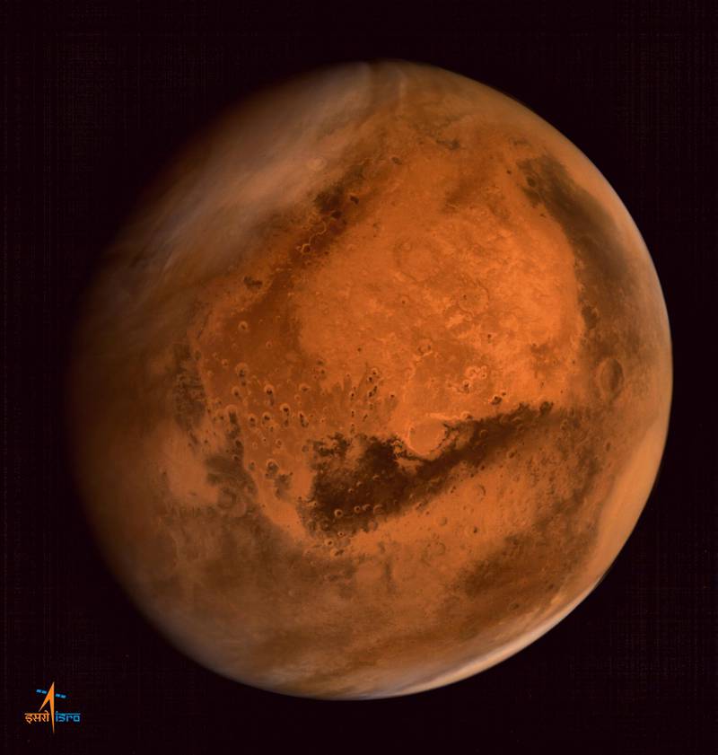 In this handout photograph received from the Indian Space Research Organisation (ISRO) on September 30, 2014, the planet Mars is seen in an image taken by the ISRO Mars Orbiter Mission (MOM) spacecraft. India won Asia's race to Mars on September 24 when its unmanned Mangalyaan spacecraft successfully entered the Red Planet's orbit after a 10-month journey on a tiny budget. Scientists at mission control let out wild cheers and applause after the gold-coloured craft fired its main engine and slipped into the planet's orbit following a 660-million kilometre (410-million mile) voyage. AFP PHOTO/ISRO ---EDITORS NOTE--- RESTRICTED TO EDITORIAL USE - MANDATORY CREDIT - "AFP PHOTO/ISRO" - NO MARKETING NO ADVERTISING CAMPAIGNS - DISTRIBUTED AS A SERVICE TO CLIENTS--- (Photo by ISRO / ISRO / AFP)