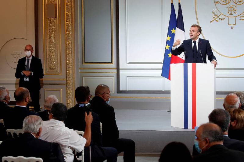 French president Emmanuel Macron delivers a speech during a ceremony in memory of the Harkis, Algerians who helped the French Army in the Algerian War of Independence.