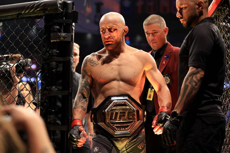 Alexander Volkanovski celebrates his unanimous decision win over Max Holloway at UFC 276. Getty
