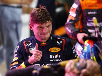 Red Bull's Max Verstappen celebrates after finishing second in the sprint race and winning the world championship at the Qatar Grand Prix in Lusail on Saturday, October 7, 2023. Reuters