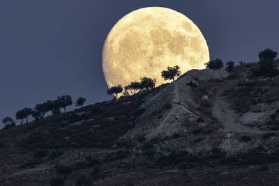 The Moon in Jindayris, in Aleppo, Syria, a day before the sturgeon supermoon. AFP