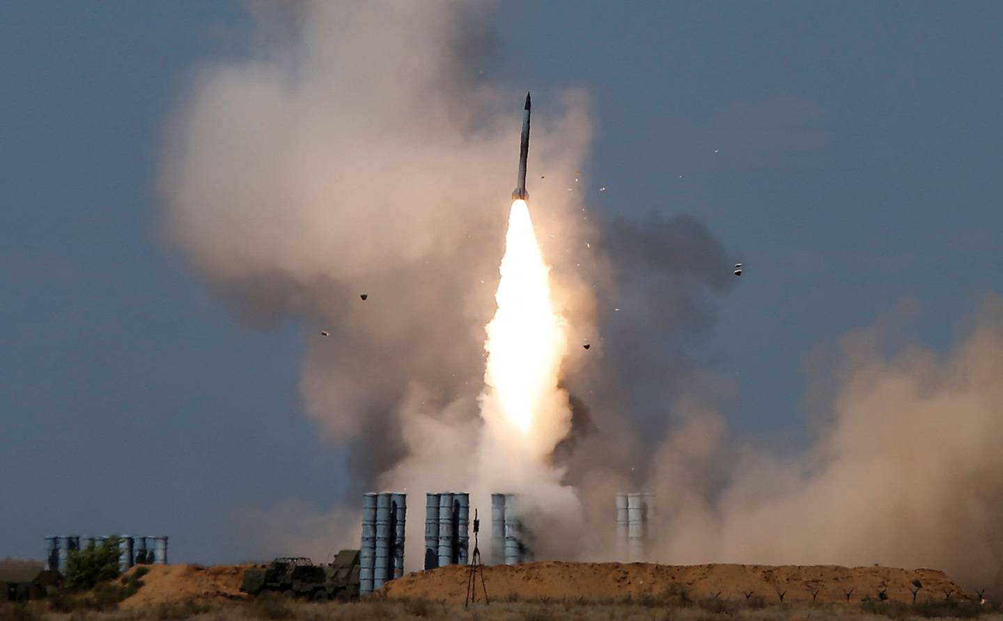  An S-300 air defence missile system launches a missile at a shooting range in Russia. Reuters
