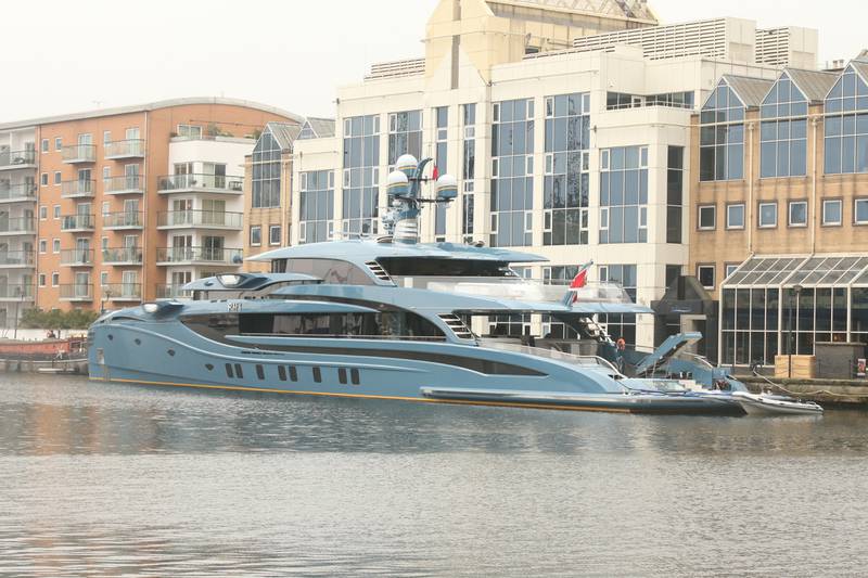 The superyacht 'Phi' owned by a Russian businessman in Canary Wharf, East London. PA