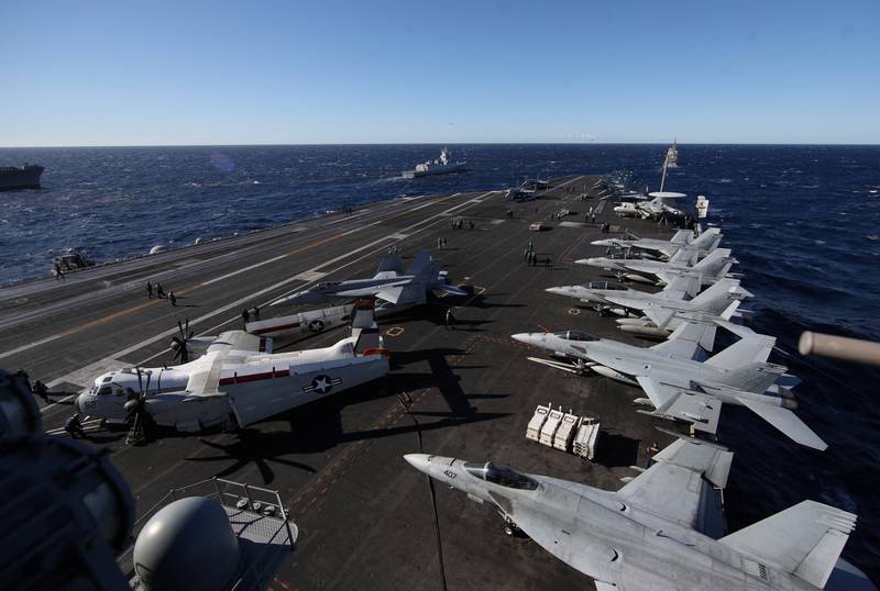 Aircraft are lined up on 'USS Harry S Truman' in the Adriatic Sea. The Truman strike group is operating under Nato command and control along with several other Nato allies for co-ordinated maritime manoeuvres, anti-submarine warfare training and long-range training. Reuters
