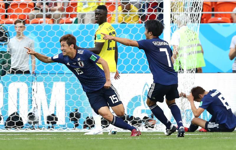 SARANSK, RUSSIA - JUNE 19:  Yuya Osako of Japan celebrates scoring the 2nd Japan goal to make it 2-1 during the 2018 FIFA World Cup Russia group H match between Colombia and Japan at Mordovia Arena on June 19, 2018 in Saransk, Russia.  (Photo by Elsa/Getty Images)