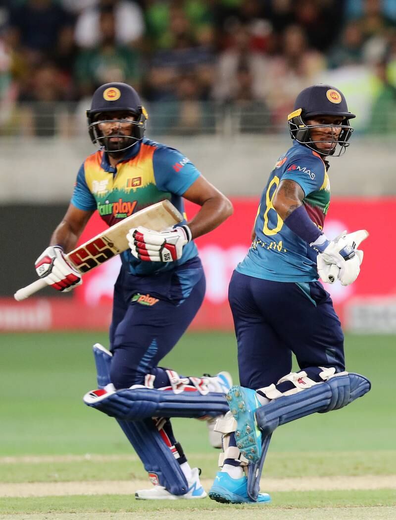 Pathum Nissanka, right, runs between the wickets with Bhanuka Rajapaksa.