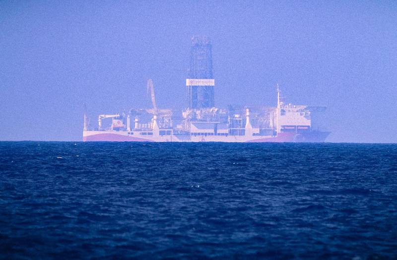 A picture taken on June 24, 2019 in the Mediterranean Sea off Cyprus approximately 20 nautical miles north-west of Paphos shows the drilling vessel Fatih, which was deployed by Turkey to search for gas and oil in waters considered part of the EU state's exclusive economic zone (EEZ). Cyprus has launched legal proceedings against three firms that it accuses of supporting illegal Turkish oil and gas exploration in its waters, a foreign ministry official said. Ankara considers much of the Cypriot-designated EEZ to be part of its continental shelf and granted exploration licences to Turkish Petroleum in 2009 and 2012. But on June 20, the EU threatened sanctions against individuals and companies involved in Ankara's "illegal drilling activities".
 / AFP / -
