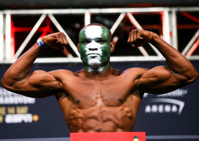Kamaru Usman poses during the ceremonial weigh-in