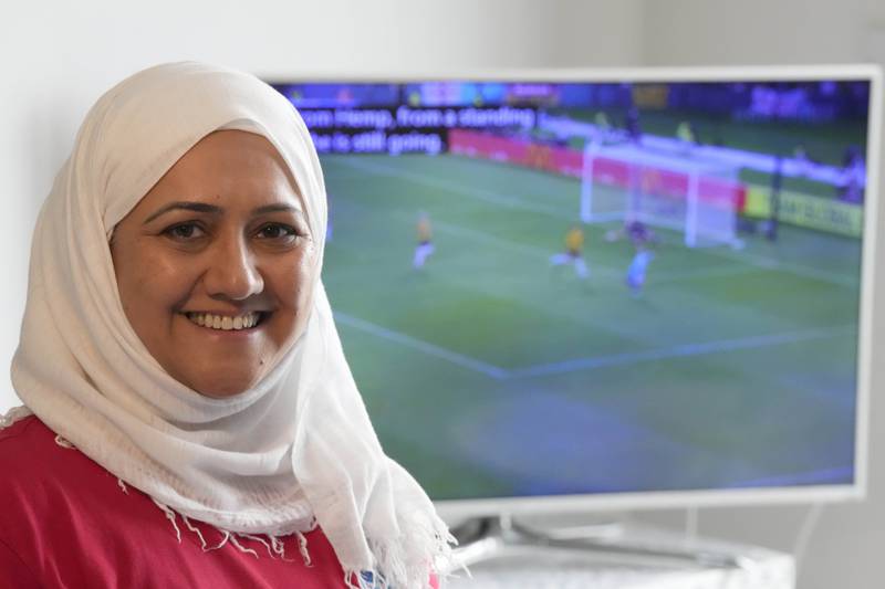Huda Jawad is a member of a fan group known as the Three Hijabis and campaigns against discrimination in football. AP