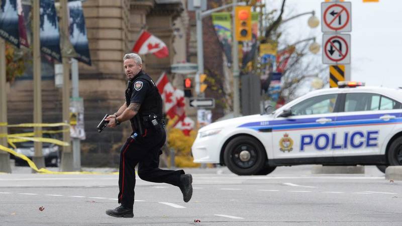 At least three people were admitted to hospital with minor injuries, while the attacker was killed. Sean Kilpatrick, The Canadian Press