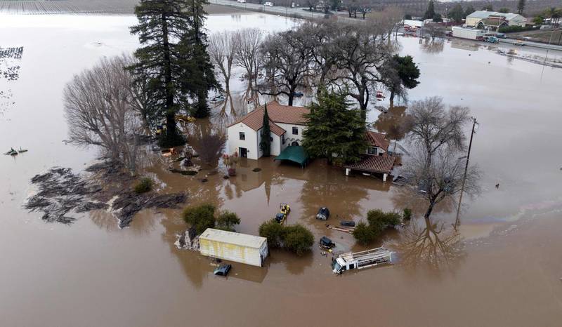 A flooded property in Gilroy, California. AFP

