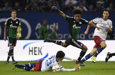 Leroy Sane, right, is making a big impression for Schalke in the Bundesliga and attracted the attention of Liverpool in the summer. Tobias Schwarz / AFP