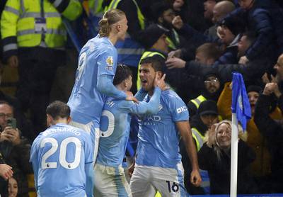 Manchester City's Rodri celebrates scoring their fourth goal with Erling Haaland and Jack Grealish. Action Images 