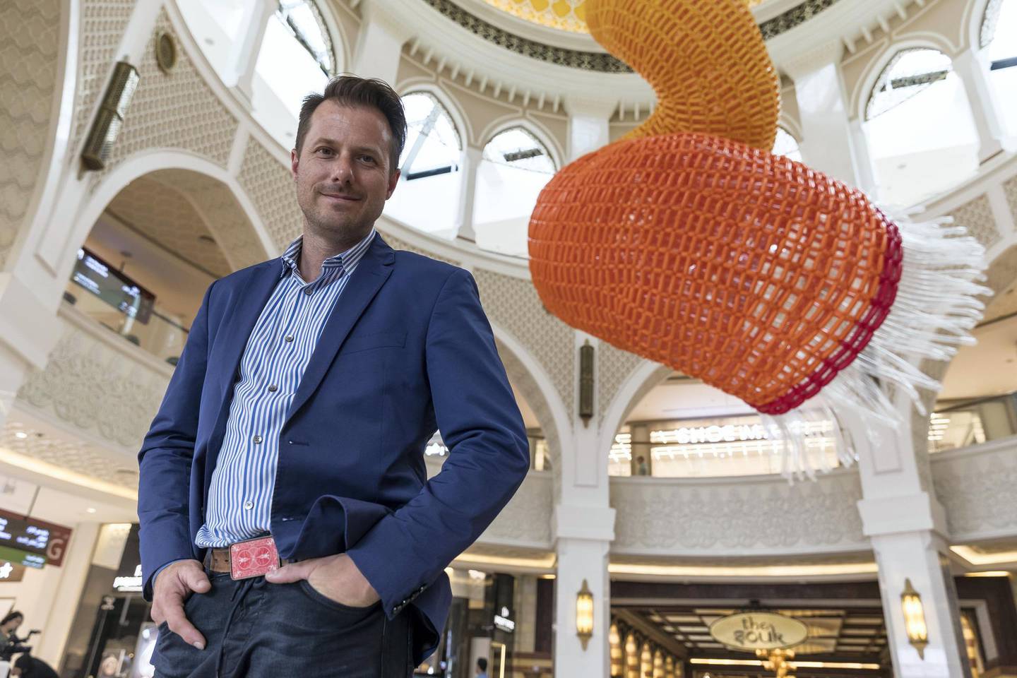 DUBAI, UNITED ARAB EMIRATES. 28 JANUARY 2018. Jason Heckenworth with his new large scale installation made out of 50 000 ballons inside Dubai Mall. (Photo: Antonie Robertson/The National) Journalist: Nyree Mcfarlane. Section: National.