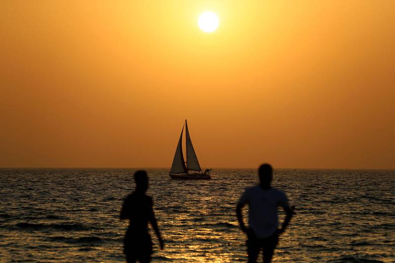 Visitors to Kite beach at sunset in Dubai on June 8th, 2021. Chris Whiteoak / The National. 
Reporter: N/A for News
