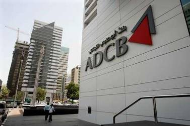 Abu Dhabi Commercial Bank is in talks with Union National Bank and Al Hilal Bank for a possible merger. Stephen Lock / The National