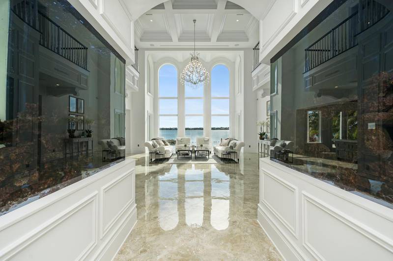 The downstairs living area is home to two 11-foot built-in fish tanks. Courtesy Sotheby’s International Realty