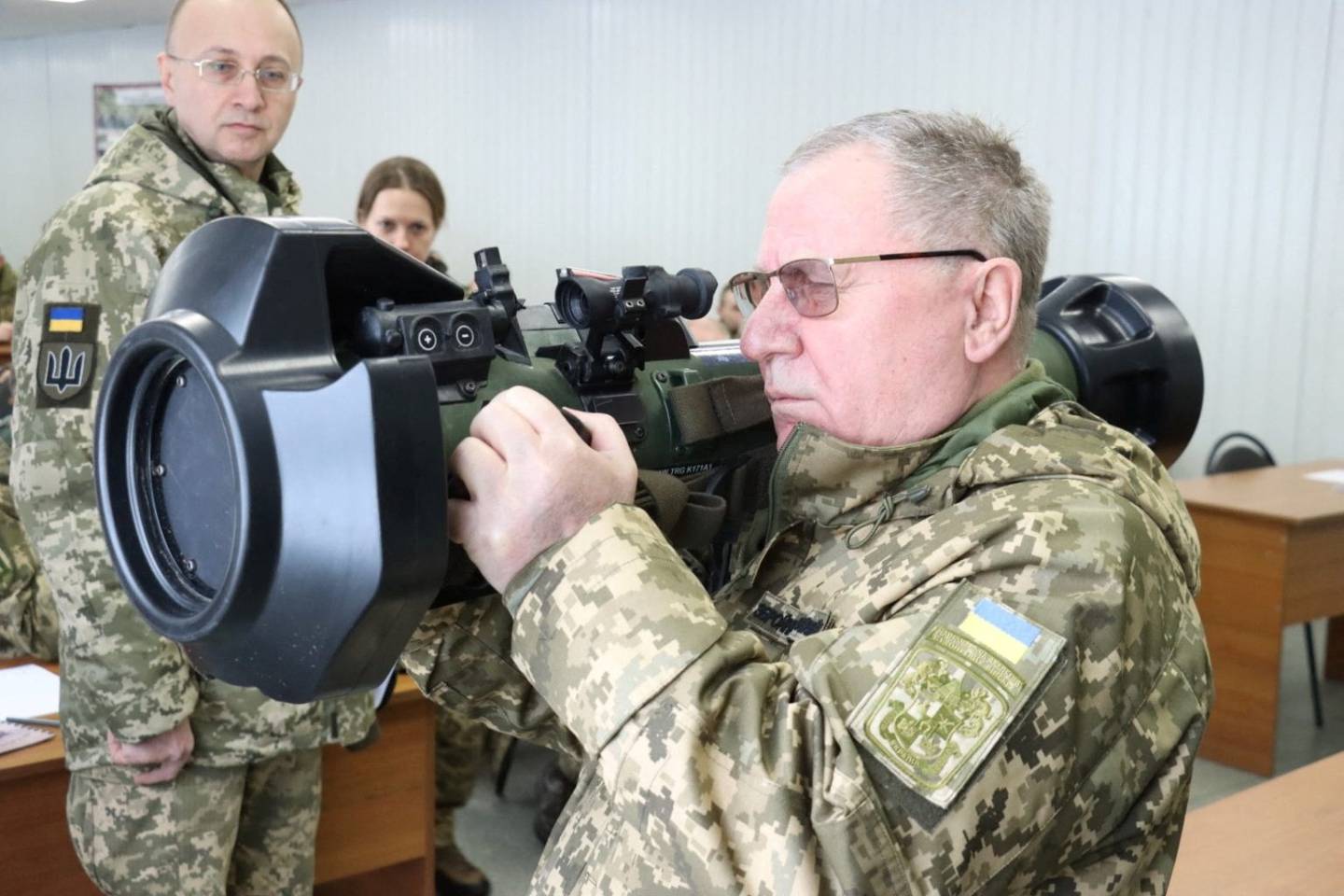 Pavlo Tkachuk, head of the Hetman Petro Sahaydachnyi National Army Academy, holds the next generation light anti-tank weapon, NLAW, supplied by Britain, during training for Ukrainian servicemembers in Lviv, Ukraine.  Ukrainian Defence Ministry/Handout via Reuters