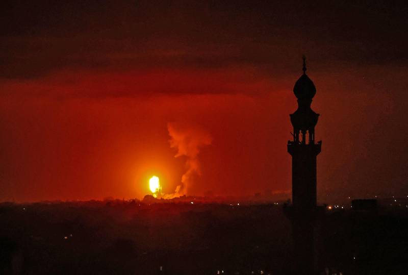 Fire billow from Israeli air strikes in the southern Gaza Strip. AFP