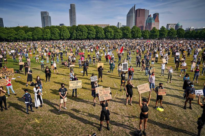 Protesters during a protest on the Malieveld in The Hague, The Netherlands. Organizer Black Lives Matter Netherlands organized the meeting in protest of violence against black people in the US and the death of 46-year-old George Floyd while in police custody.  EPA