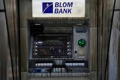 Angry depositors also poured diesel on a Blom Bank ATM. AP
