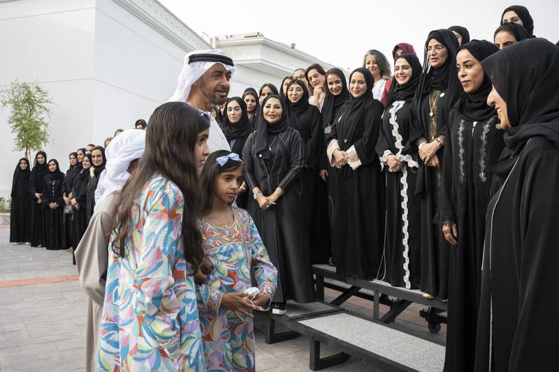 Sheikh Mohamed bin Zayed, Crown Prince of Abu Dhabi and Deputy Supreme Commander of the Armed Forces, centre, speaks with a delegation of women  representative of UAE society, on International Women’s Day.  All photos: Ministry of Presidential Affairs