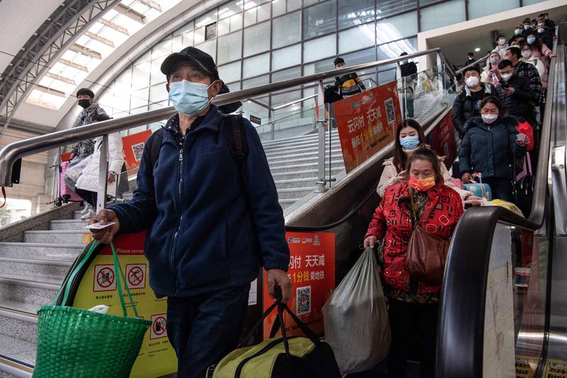 Passengers at Hankou railway station in Wuhan. China is bracing itself for an increase in the spread of coronavirus infections amid the large amount of travelling. AFP