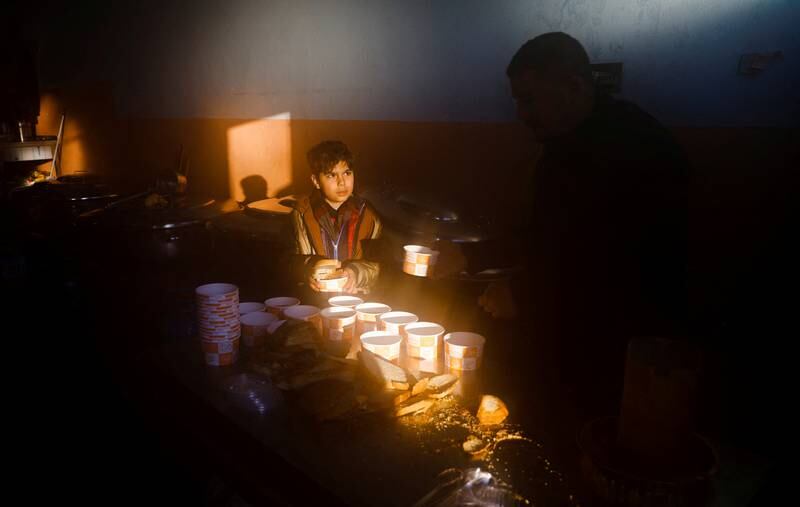 A child receives food in Kahramanmaras, Turkey. Reuters