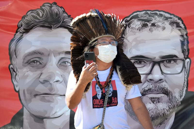Images of Dom Phillips, left, and Bruno Pereira at a rally held by indigenous Brazilian activists. AFP