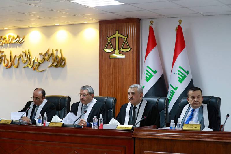 Iraqi judges at the Supreme Judicial Council in Baghdad on December 27. AFP