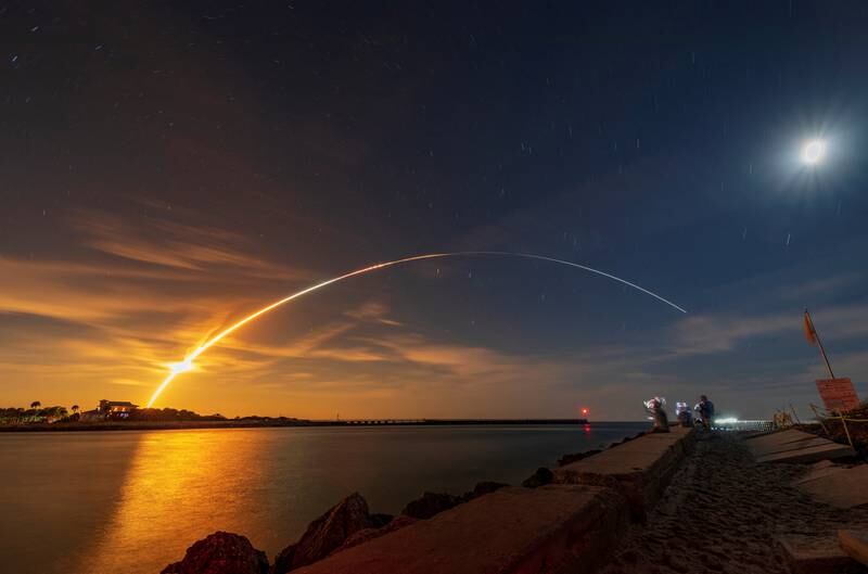 Nasa's next-generation Moon rocket, the Space Launch System with the Orion crew capsule, lifts off from launch complex 39-B on the unmanned Artemis 1 mission to the Moon, seen from Sebastian, Florida. Reuters