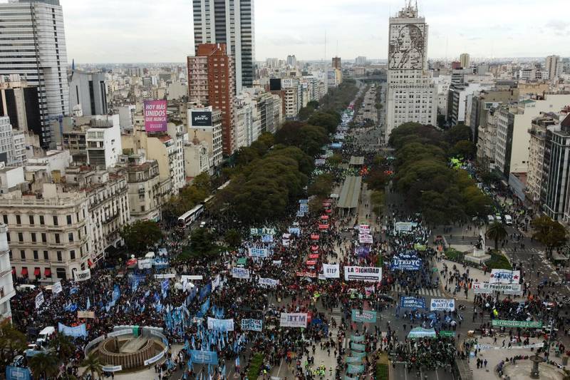 People hold a demonstration against rising inflation in Buenos Aires. AFP