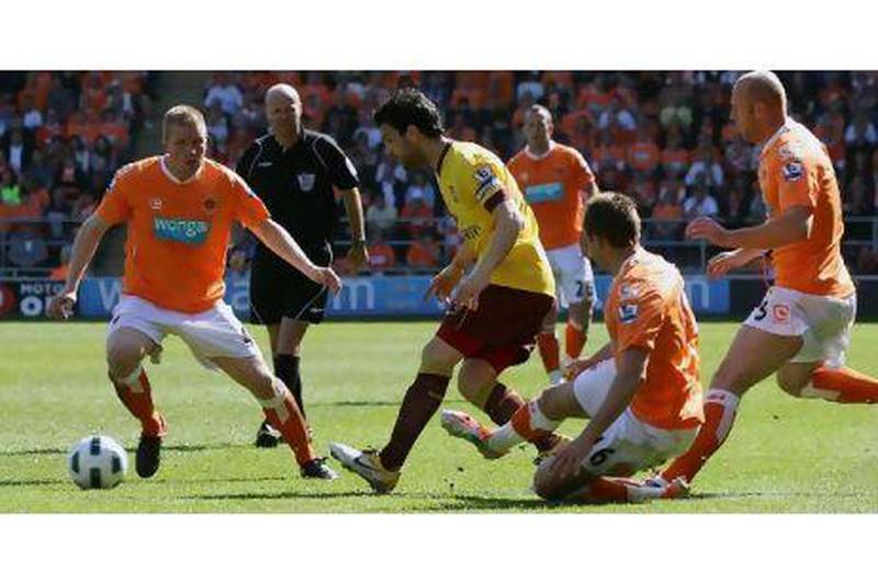 Some Blackpool players were guilty of letting their heads drop against a Cesc Fabregas-inspired Arsenal, centre, on Sunday. Defeat to Wigan on Saturday could go some way to sealing their relegation fate.