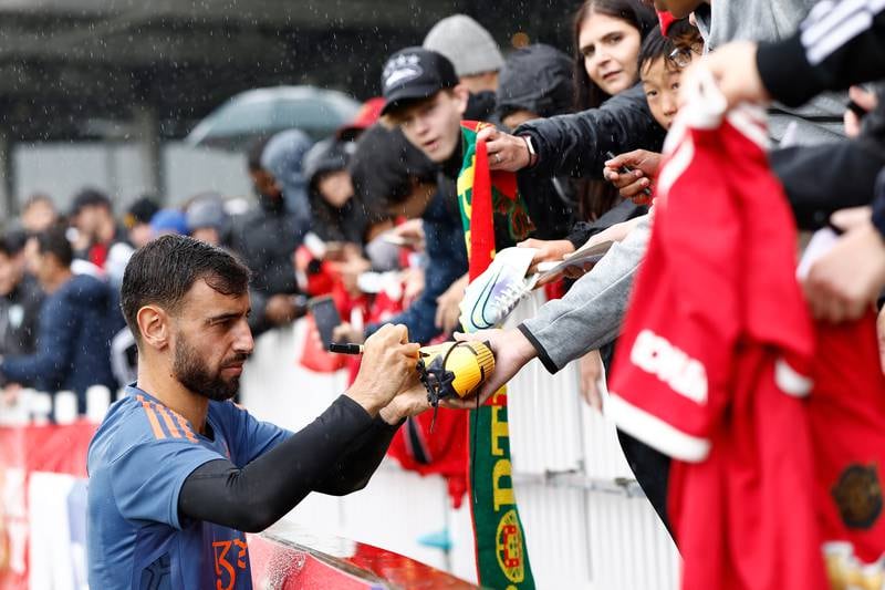 Bruno Fernandes of Manchester United signs autographs. Getty Images
