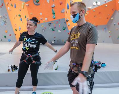 Abu Dhabi, United Arab Emirates, August 20, 2020.  Bianca Sammut, Acting Head of Yas Theme Parks and Jason Von Berg of The National warm up before taking on the wall.Victor Besa /The NationalSection:  NAReporter:  Jason Von Berg
