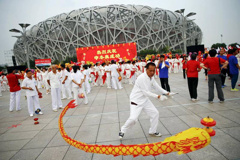 People celebrate after Beijing was chosen to host the 2022 Winter Olympics. Damir Sagolj / Reuters