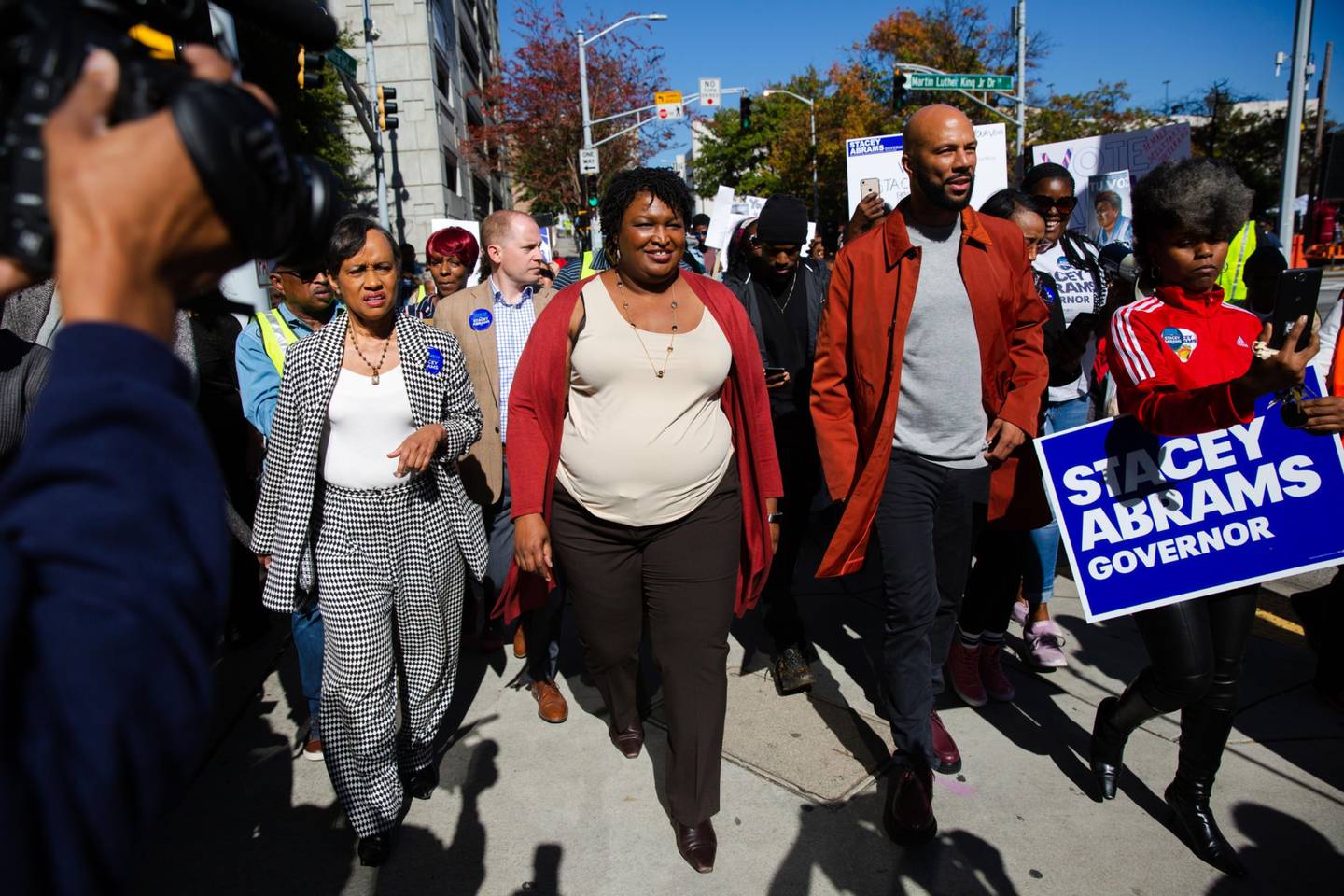 Stacey Abrams, Democratic nominee for governor of Georgia, and musical artist Common get out the vote on the streets of Atlanta. Bloomberg