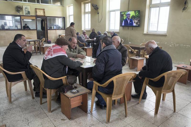 Palestinian men , most who are Orthodox Christians ,playing backgammon on a Friday morning at the Arab Orthodox Cultural Center in the West Bank city of Beit Sahour near Bethlehem on January 18,2019 .
(Photo by Heidi Levine for The National).